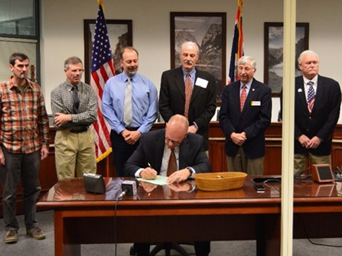 Governor Matt Mead signing bill